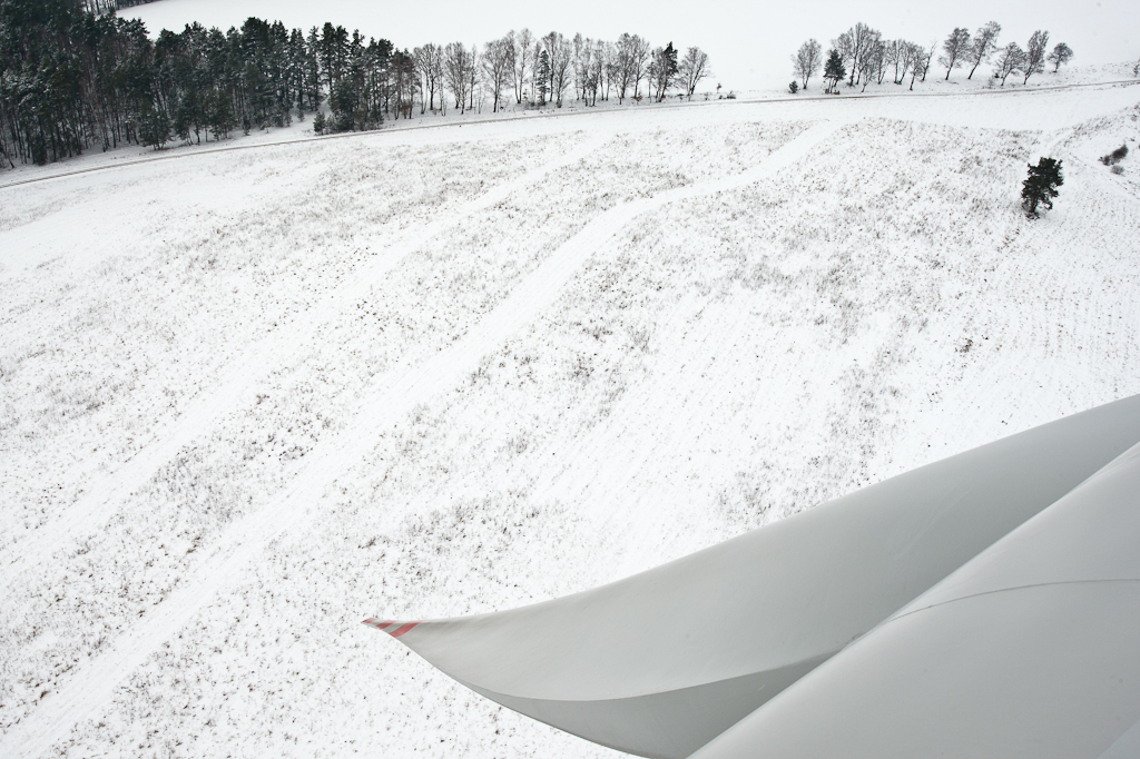 A snow covered field seen from a wind turbine in Kobylnica, Poland.