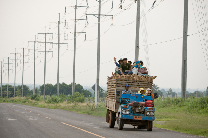 A truck full of farm produce drives down one of the newly paved roads thanks to the wind farm from Wind Energy Holdings. The wind farm in the Nakhon Ratchasima district is the largest in Thailand.